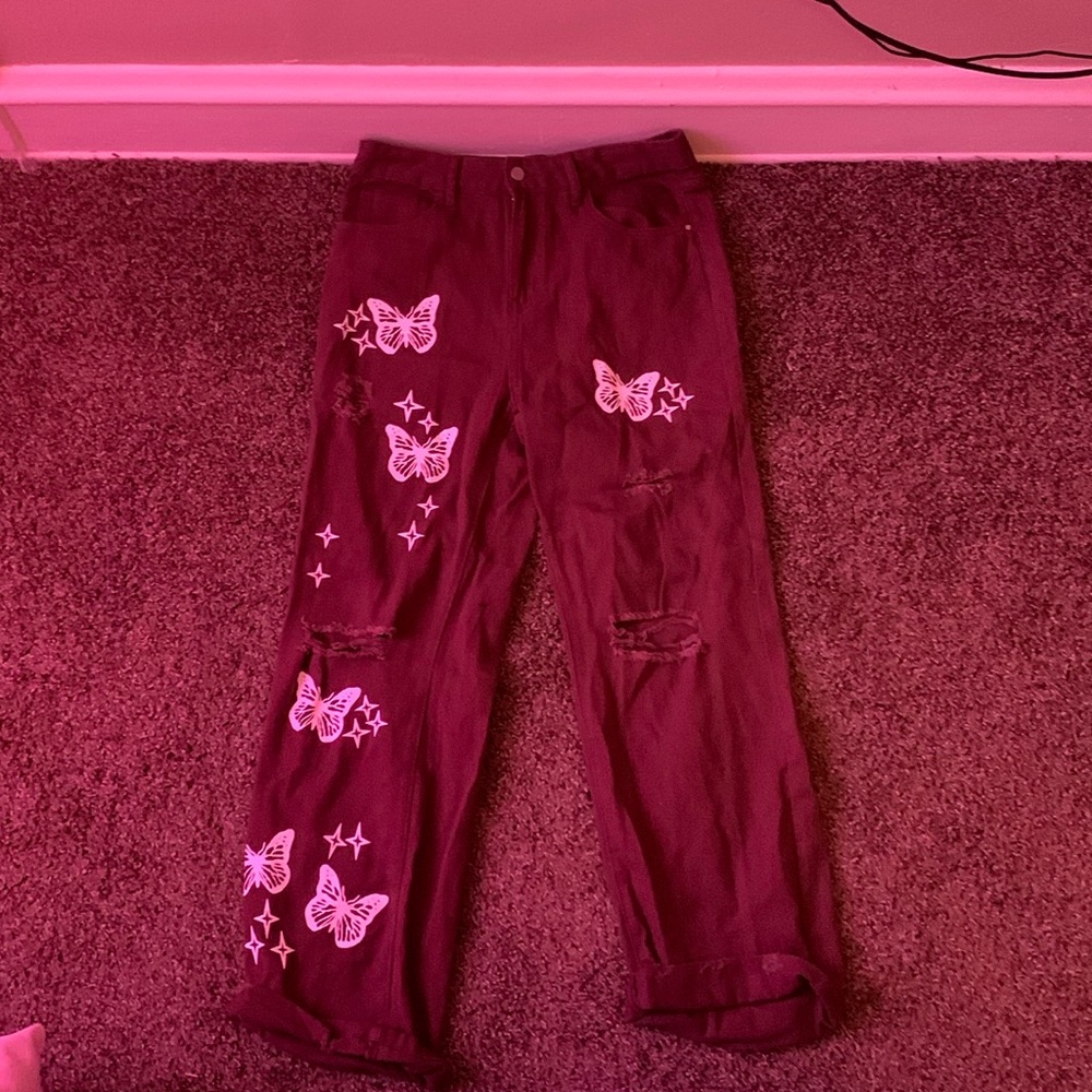 BROWN BAGGY RIPPED JEANS WITH BUTTERFLY DESIGN AND